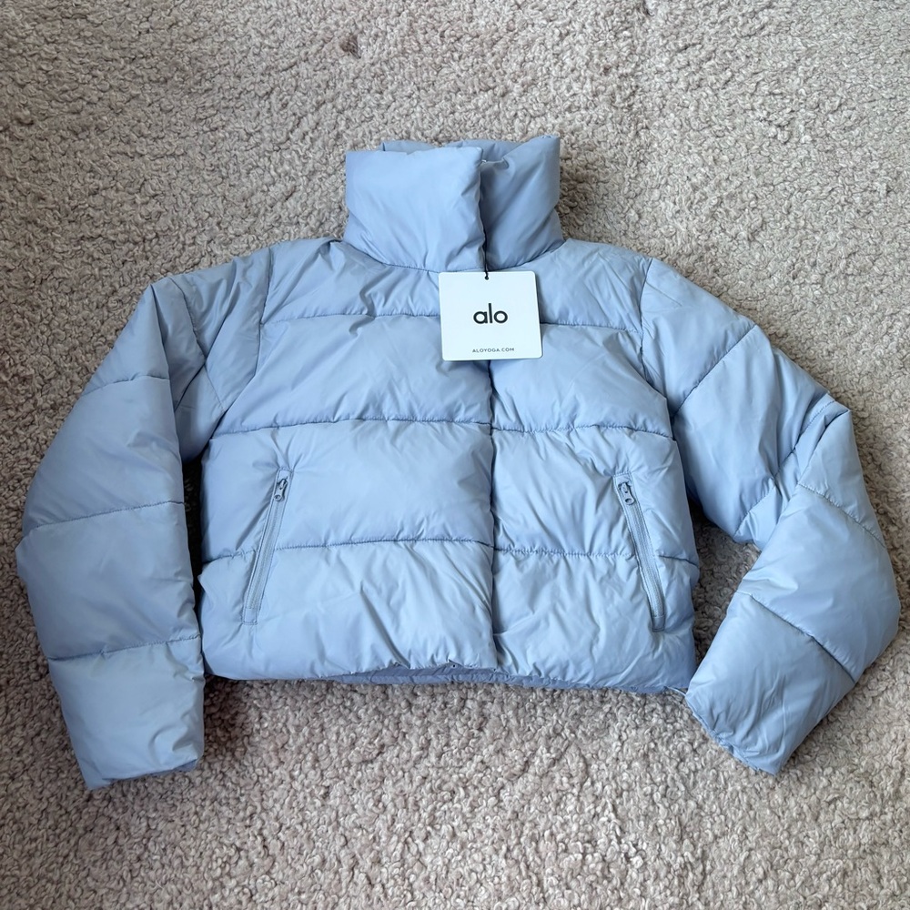 ALO Yoga “Gold Rush” Puffer Jacket in Celestial Blue